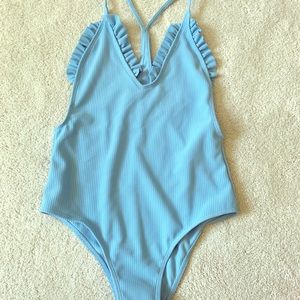 Blue swimsuit, never been worn.